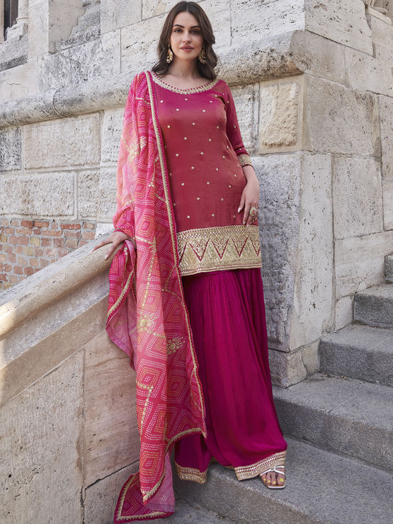 Silk Wedding Salwar Kameez
in Pink and Majenta with Zari work