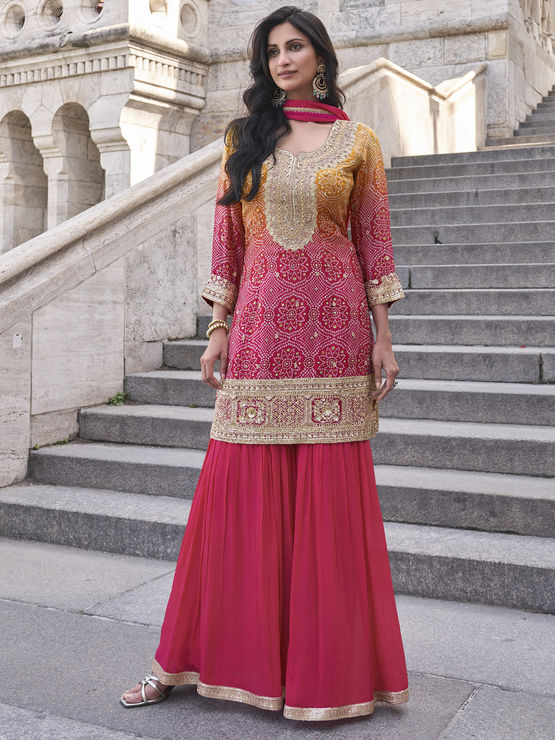 Silk Wedding Salwar Kameez
in Pink and Majenta with Zari work