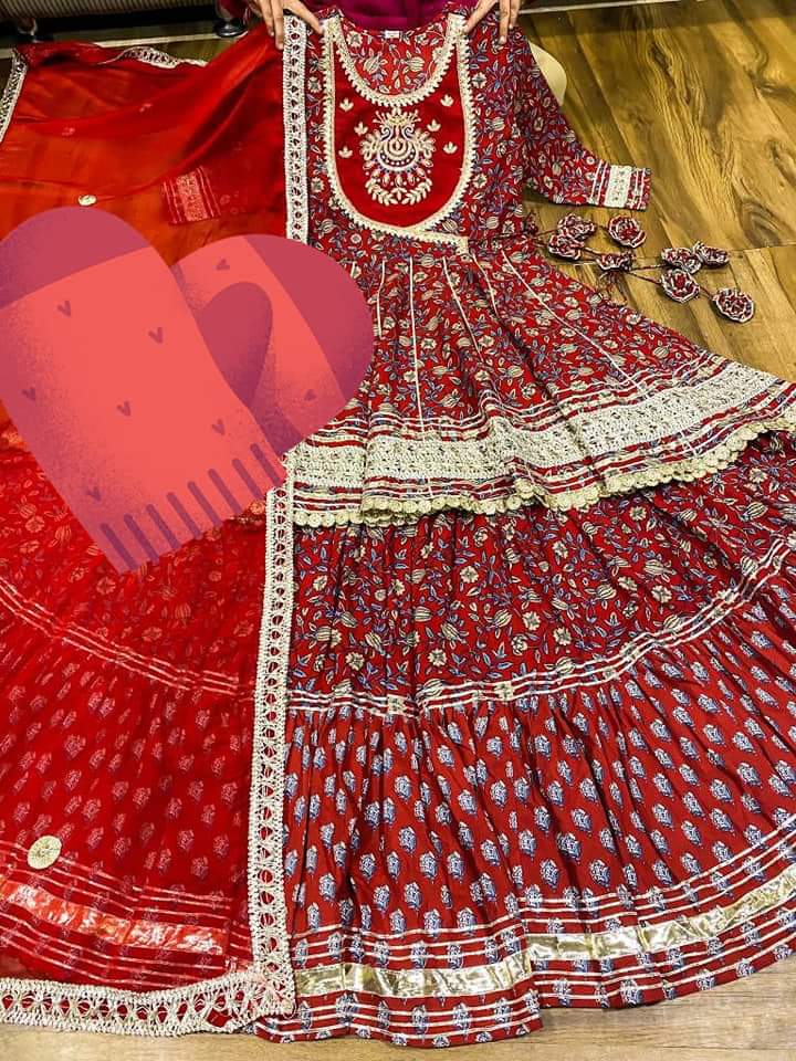 Premium cotton kalamkari print peplum detailed with beautiful work on yoke with heavy gota work & beautiful tassles . Premium cotton kalamkari & block print skirt with heavy gota detailing. Premium chiffon dupatta with gota lace & gota flower