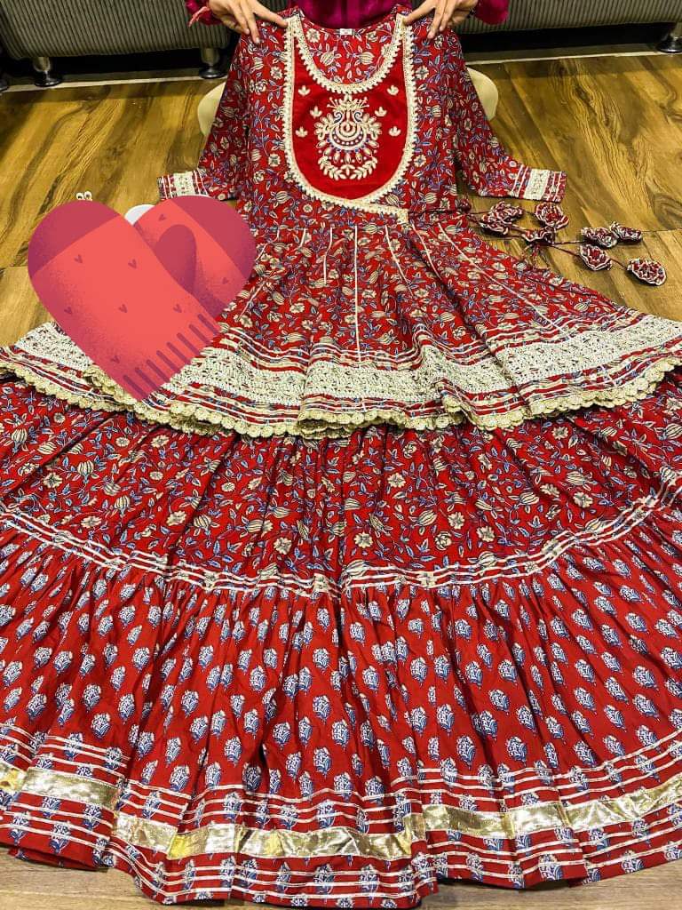 Premium cotton kalamkari print peplum detailed with beautiful work on yoke with heavy gota work & beautiful tassles . Premium cotton kalamkari & block print skirt with heavy gota detailing. Premium chiffon dupatta with gota lace & gota flower