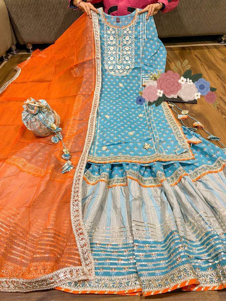 Premium cotton kurti with heavy gota detailing & lace on yoke Kota silk dupatta with lace & cotton print flare sharara with heavy gota lace Complimentary bag ( potli)