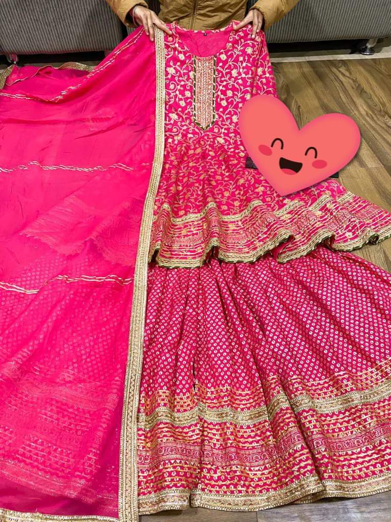 Premium cotton peplum & sharara detailed with gold liquid zari all over & hand work on yoke with heavy gota detailing all over paired with chiffon dupatta with gota detailing