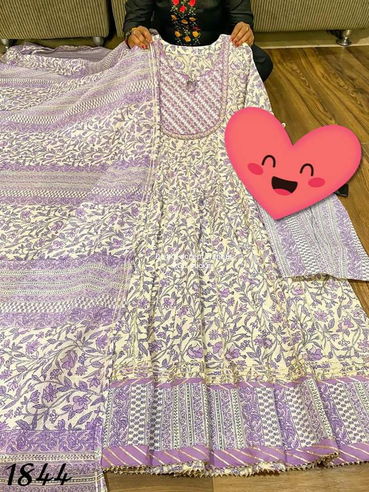 Premium kalamkari print corton anarkali gown detailed with beautiful mirror work & heavy gota work all over paired with cotton pant & mal cotton duppata .