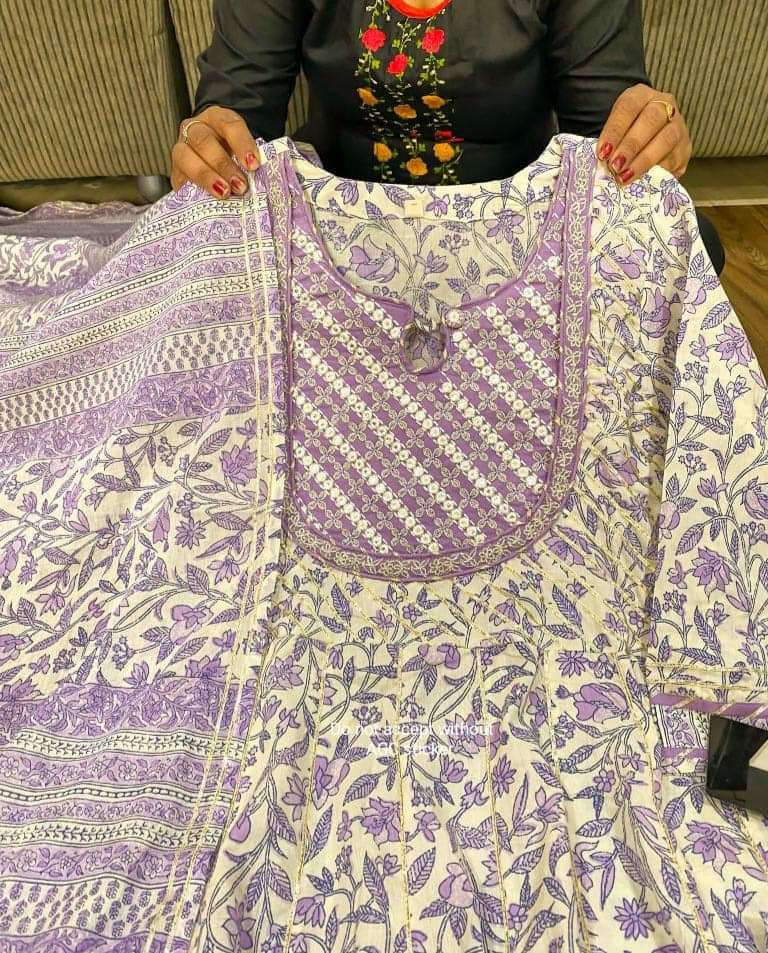 Premium kalamkari print corton anarkali gown detailed with beautiful mirror work & heavy gota work all over paired with cotton pant & mal cotton duppata .