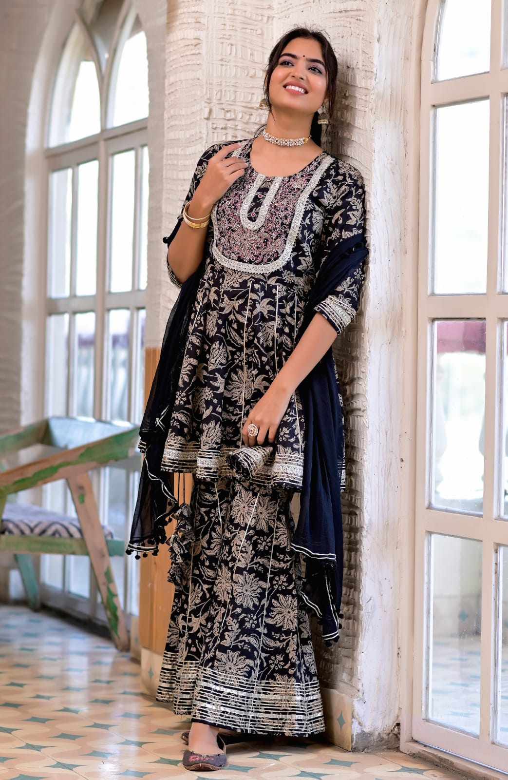 Premium cotton anarkali Gown with lining inside in beautiful schiffli pattern with mirror work.. Paired up with beautiful bandhni colourful dupatta