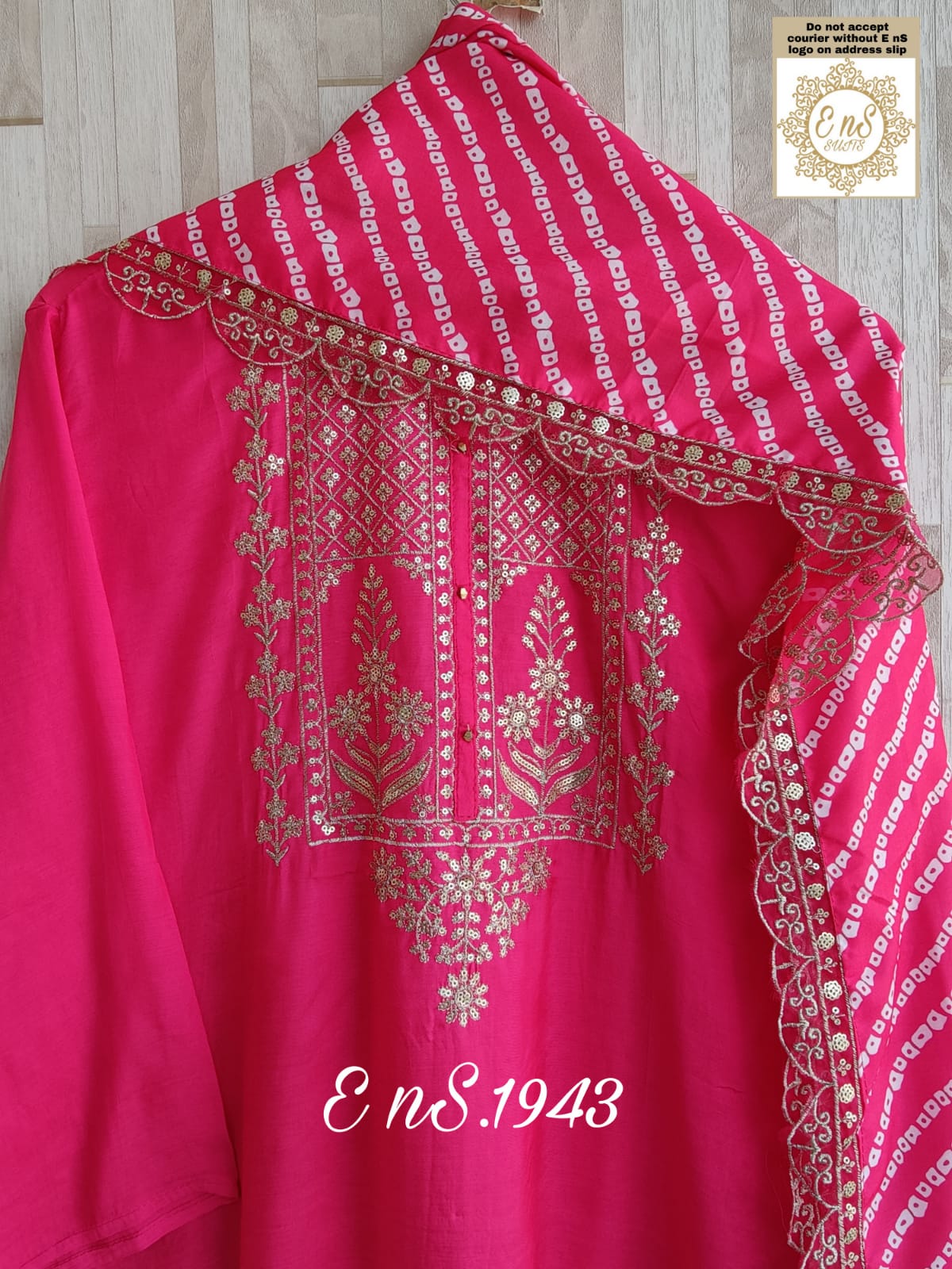Pure russian silk with beautiful Patra mirror,gotta patti and resham embroidery on neck with tuscons ,gotta lace on ghera and sleeves, pure organza duppta with beautiful gotta patti and mirror handwork embroidery on duppta with print border