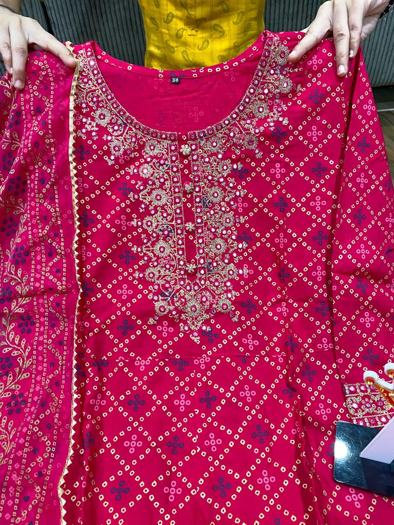 Premium reyon slub bandhani print anarkali gown with beautiful zari embroidery on yoke & sleeves paired with pant & chiffon dupatta