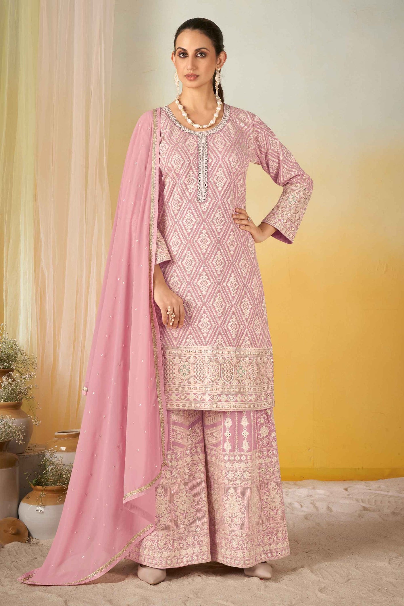 Ethnic Georgette Embroidered Palazzo Suit In Pink Color