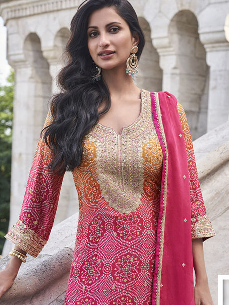Silk Wedding Salwar Kameez
in Pink and Majenta with Zari work