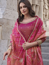 Silk Wedding Salwar Kameez
in Pink and Majenta with Zari work