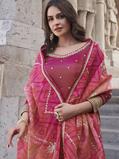 Silk Wedding Salwar Kameez
in Pink and Majenta with Zari work