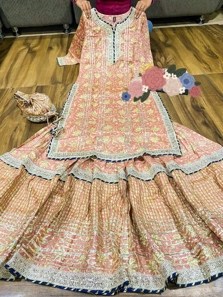 Premium cotton   kurti with  heavy gota detailing & lace on yoke Cotton dupatta with  lace & cotton print flare sharara with heavy gota lace   Complimentary bag (potli)