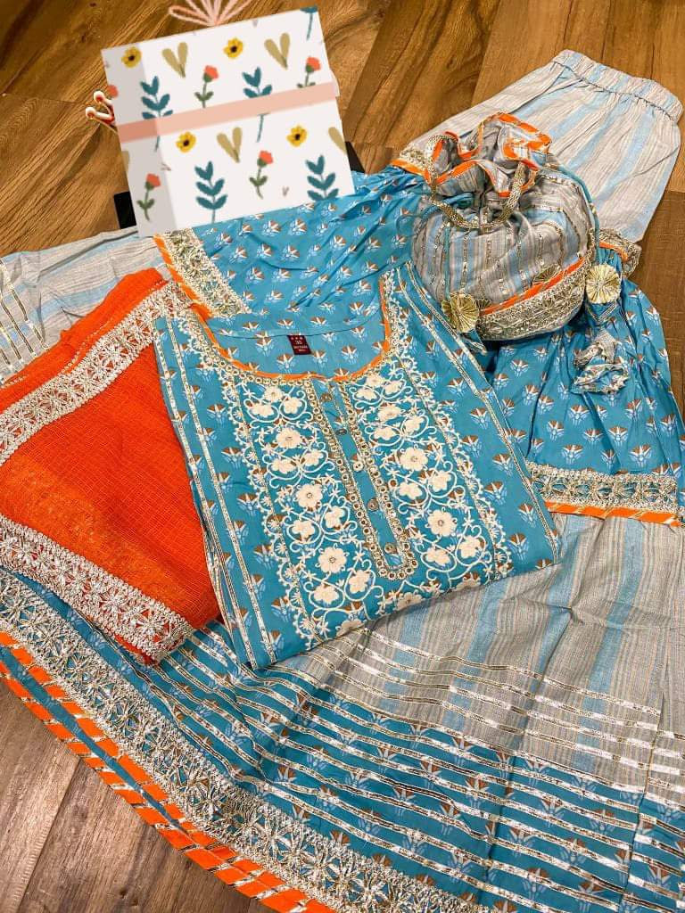 Premium cotton kurti with heavy gota detailing & lace on yoke  Kota silk  dupatta with  lace  & cotton print flare sharara with heavy gota lace   Complimentary bag ( potli)