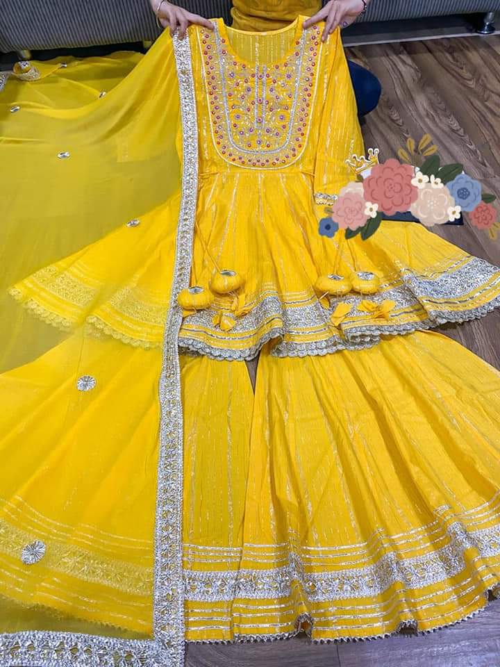 Premium cotton Lurex peplum detailed with beautiful zari embroidery & mirror work on yoke with heavy gota work & tassles .  💛❤️ Premium cotton Lurex sharara with heavy gota detailing   💛❤️ Premium chiffon dupatta with gota lace & gota flower