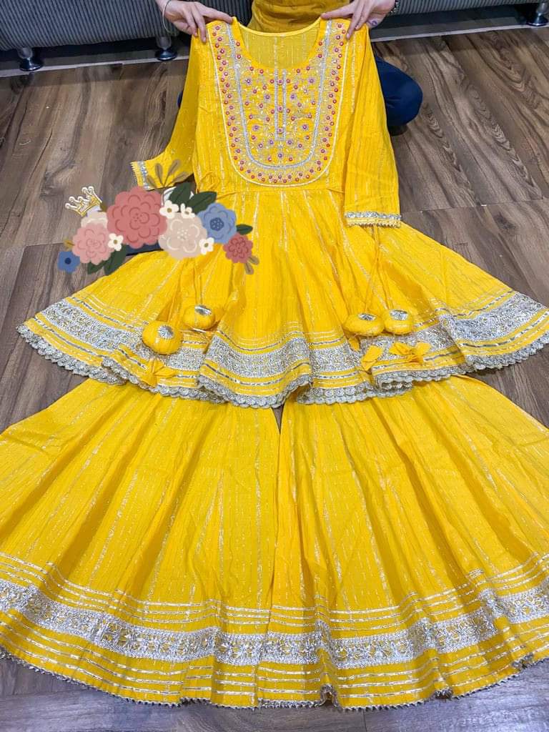 Premium cotton Lurex peplum detailed with beautiful zari embroidery & mirror work on yoke with heavy gota work & tassles .  💛❤️ Premium cotton Lurex sharara with heavy gota detailing   💛❤️ Premium chiffon dupatta with gota lace & gota flower