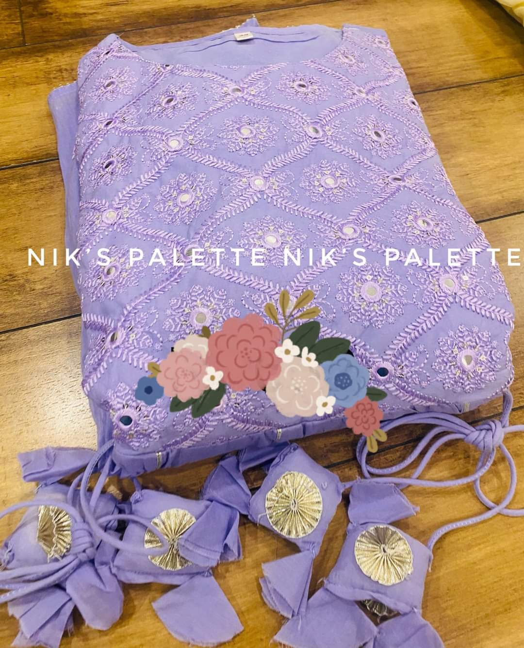 Premium malmal cotton anarkali flair gown with beautiful side tussels  Zari embroidery sequins & foil mirror work on yoke  Mul lining attached