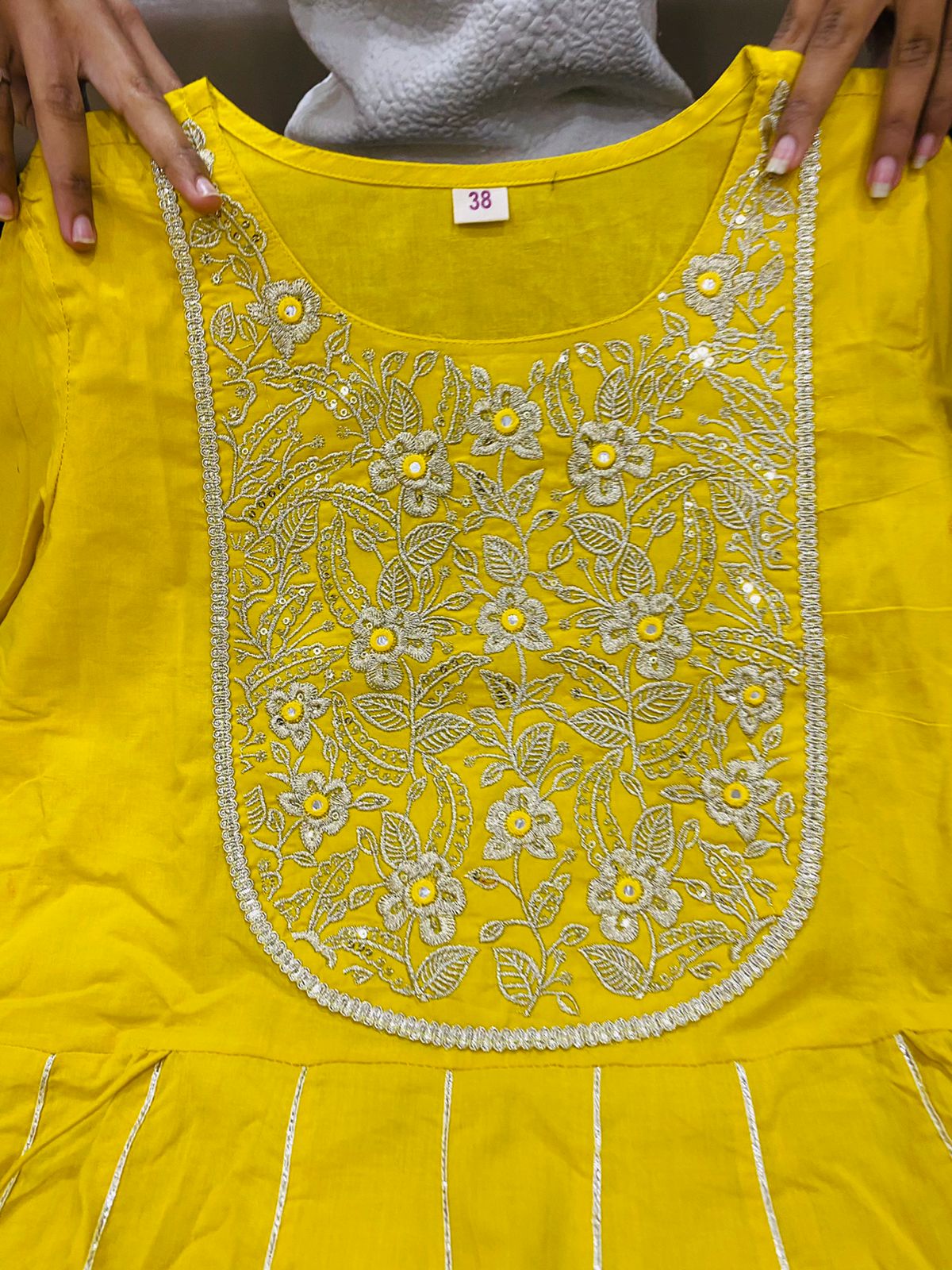 Premium cotton anarkali gown detailed with embroidery on yoke with gota work & heavy tassels  Chiffon dupatta with gota lace & all over gota buti