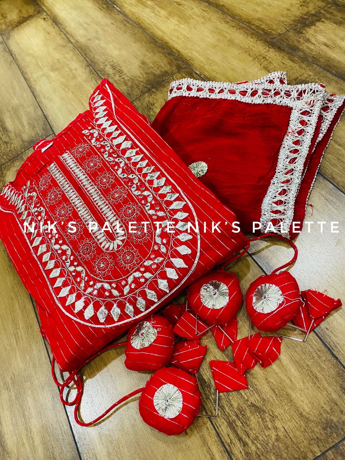 Premium *Lurex cotton* anarkali gown detailed with embroidery on yoke with gota work & heavy tassels  Chiffon dupatta with gota lace & all over gota buti..