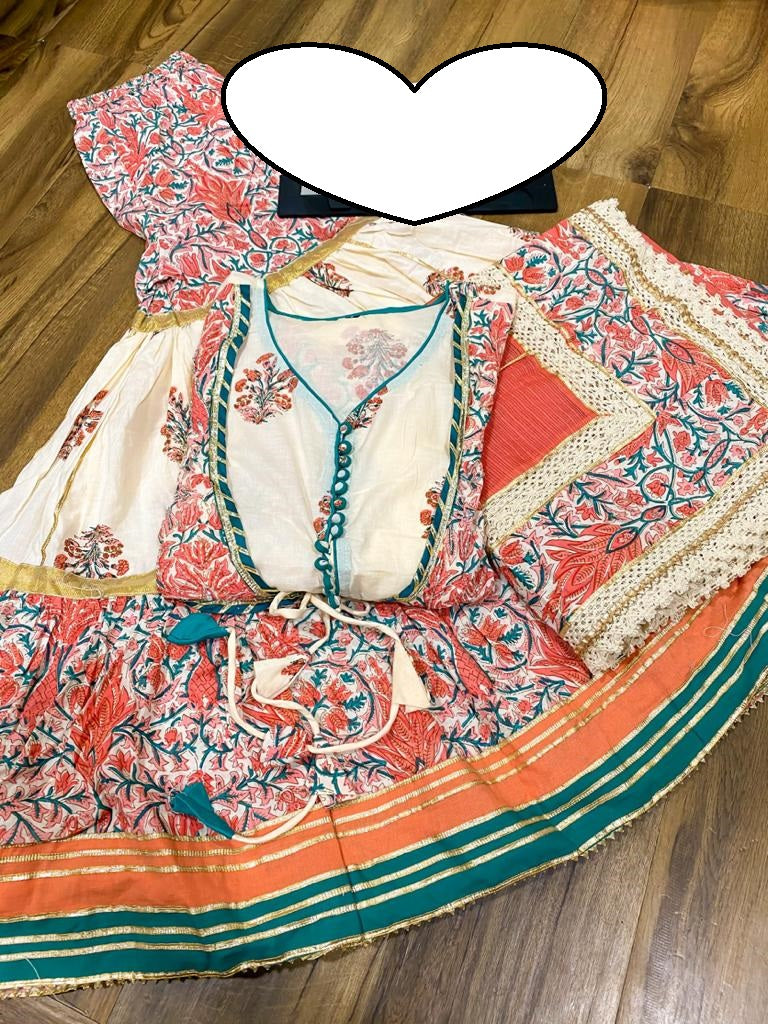 Premium cotton peplum with attached jacket detailed with pipe work , tassles & gota work.