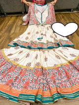 Premium cotton peplum with attached jacket detailed with pipe work , tassles & gota work.