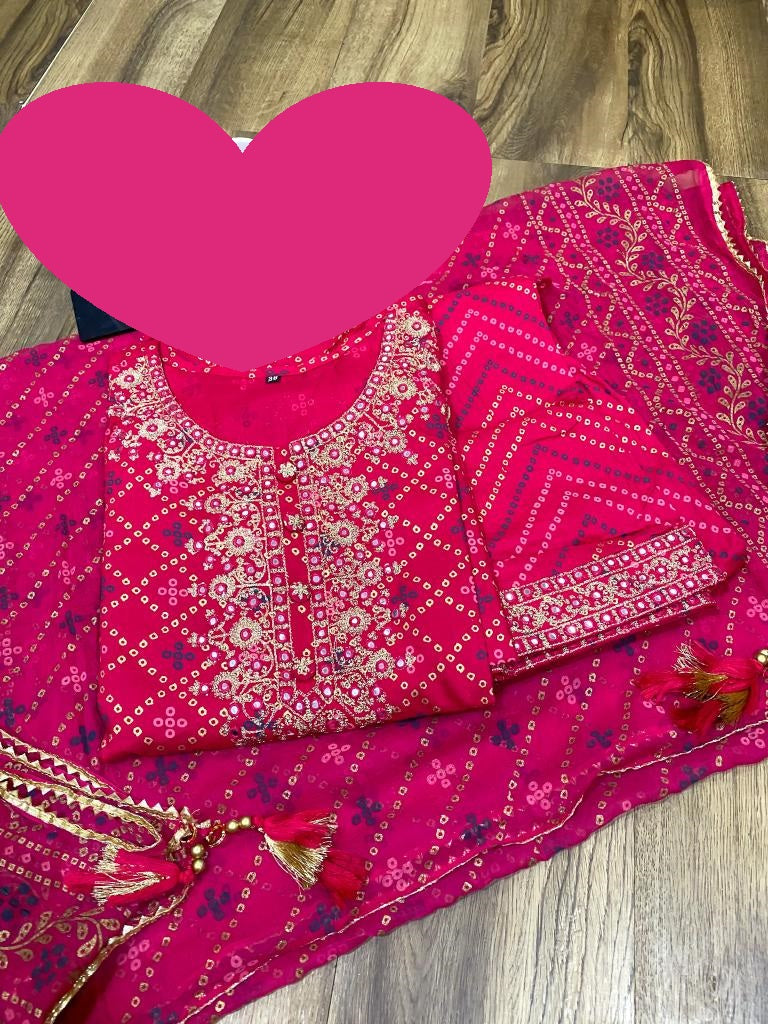 Premium reyon slub bandhani print anarkali gown with beautiful zari embroidery on yoke & sleeves paired with pant & chiffon dupatta