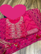 Premium reyon slub bandhani print anarkali gown with beautiful zari embroidery on yoke & sleeves paired with pant & chiffon dupatta