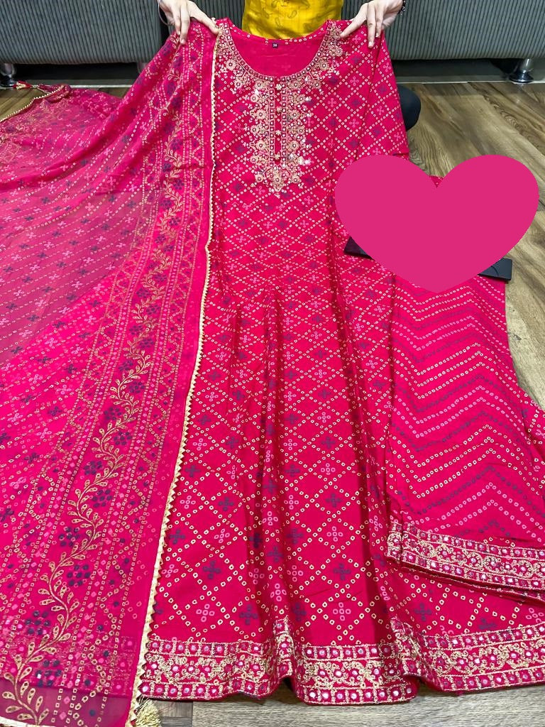 Premium reyon slub bandhani print anarkali gown with beautiful zari embroidery on yoke & sleeves paired with pant & chiffon dupatta