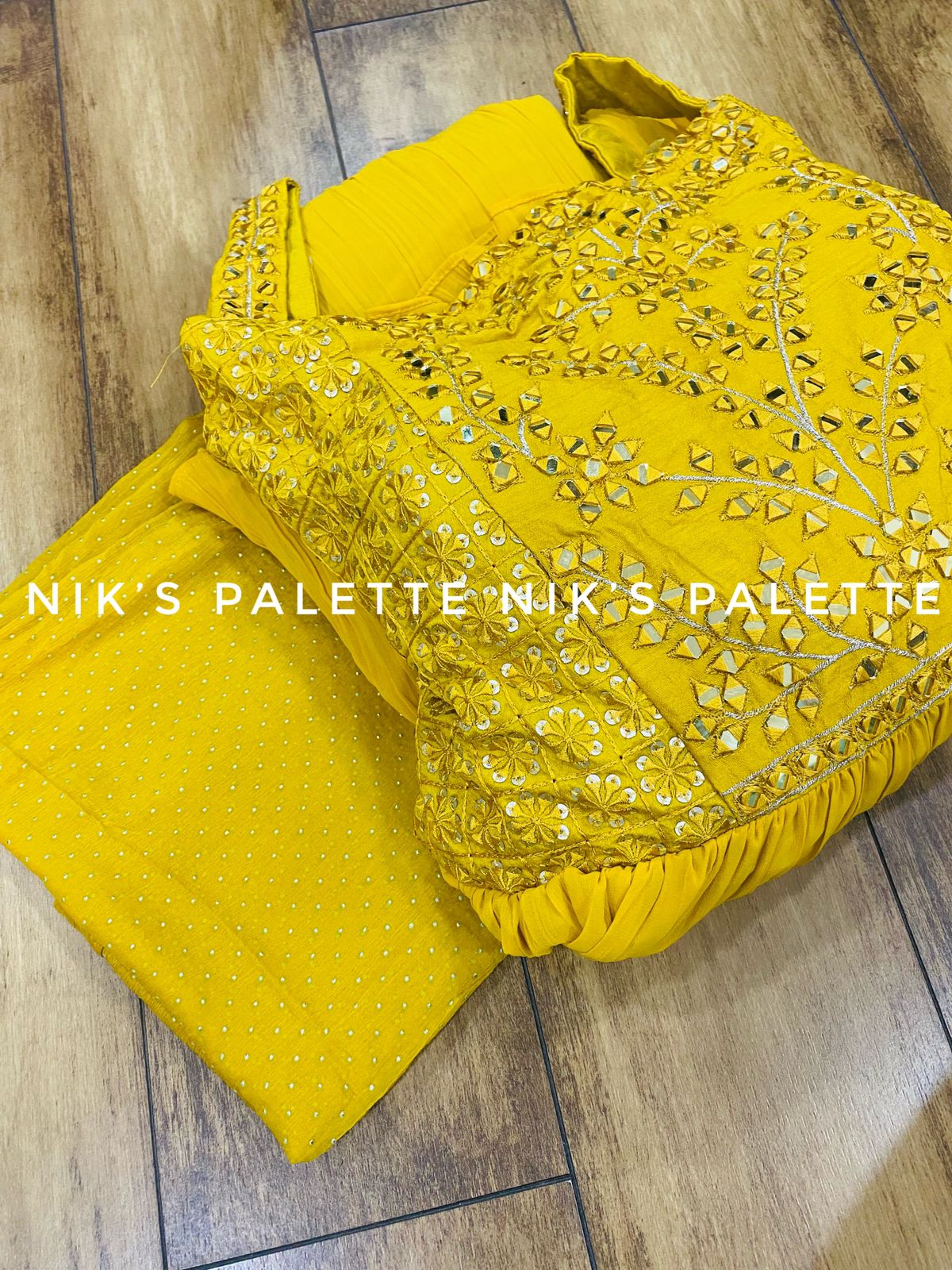 Premium Georgette tier pattern gown with attached sleeves inside  with attached cancan Paired with Georgette duppata  Beautiful foil mirror work on yoke